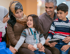 Refugee family smiling