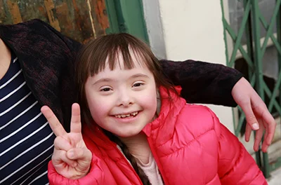 Close-up portrait of beautiful girl in the city
