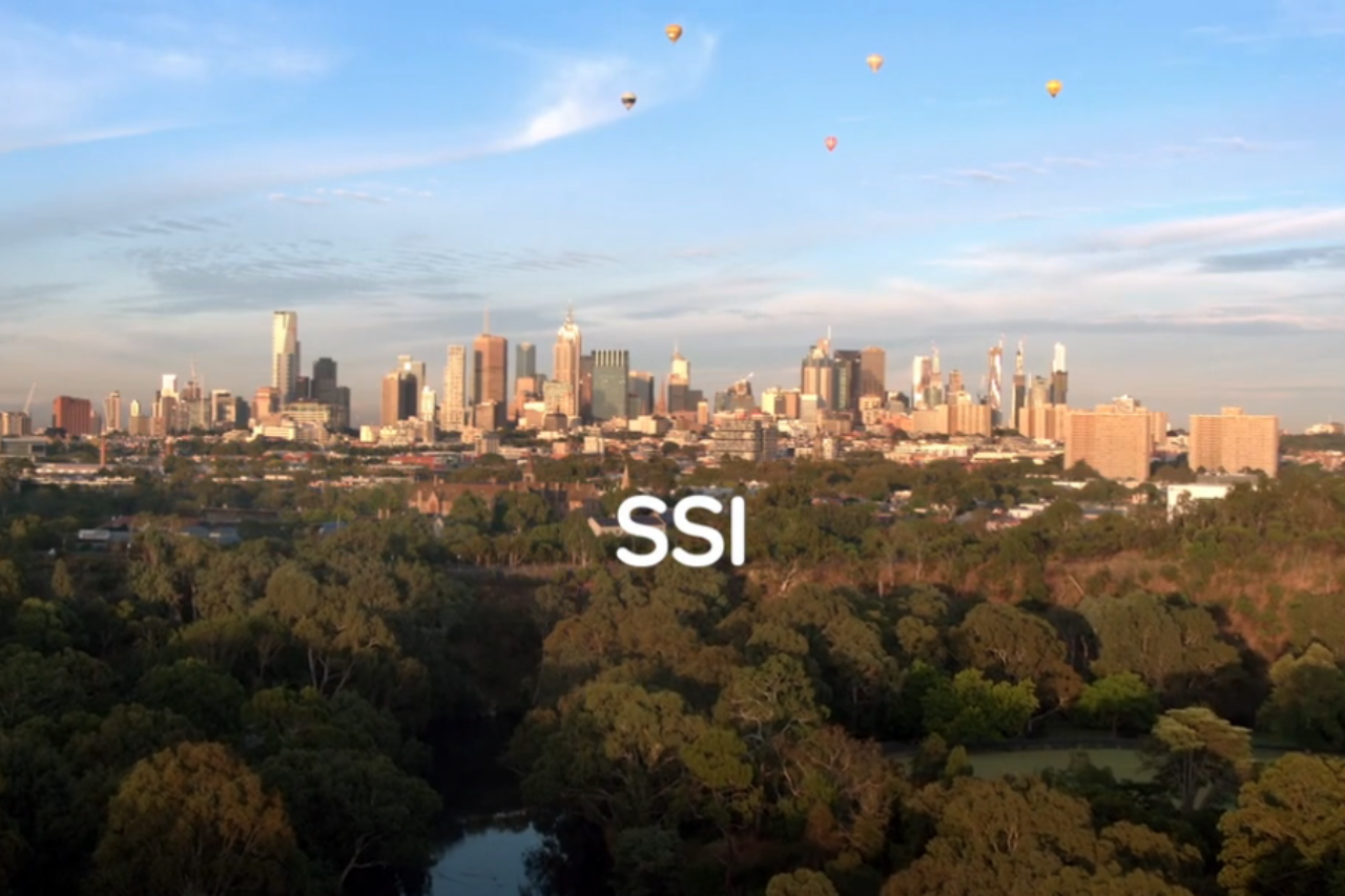 Beautiful view of nature with balloons in the sky and the SSI logo in the centre.
