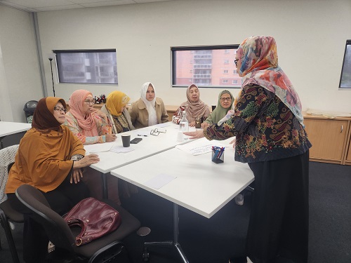 Group of ladies at information session about modern slavery