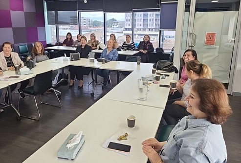 Group of people at information session about modern slavery
