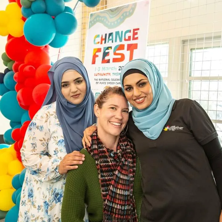 Three women standing together