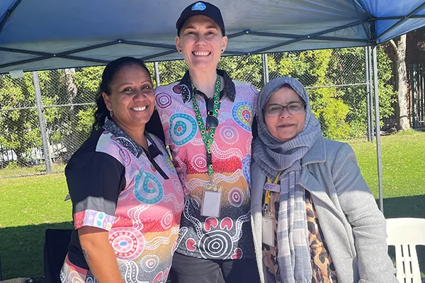SSI staff at community stall