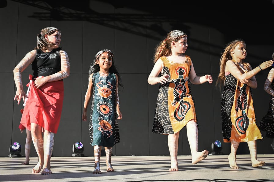 Four children perform on stage at World of Cultures 2024