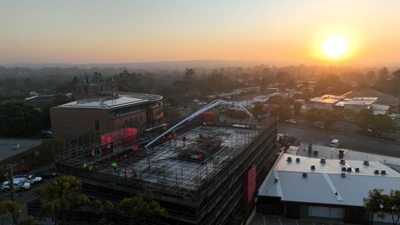 A sunrise over the Logan Hub building site
