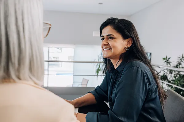 Businesswomen talking