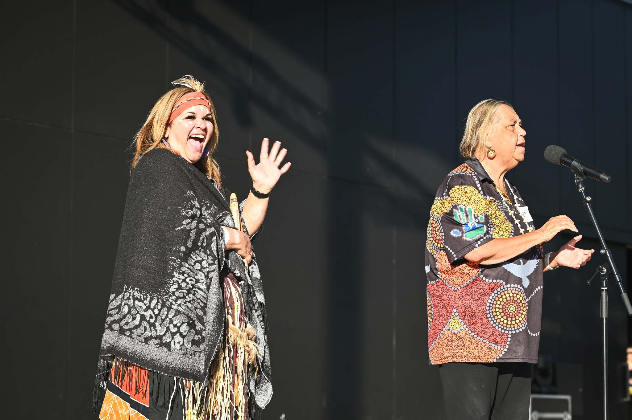 Aunty Robyn addresses the crowd at World of Cultures 2025