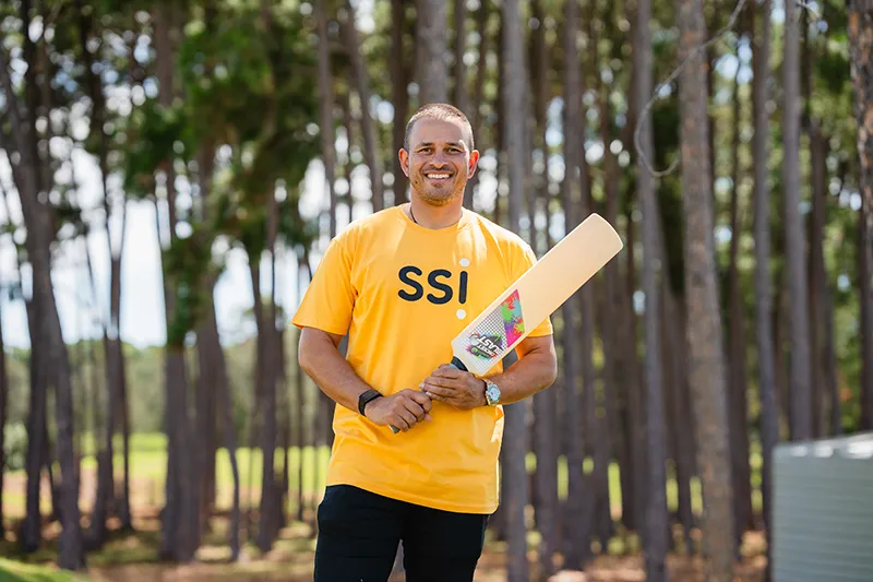Usman Khawaja at Foundation Clinic event wearing SSI t-shirt