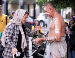 Uncle Terry and Afghan Woman in smoking ceremony.